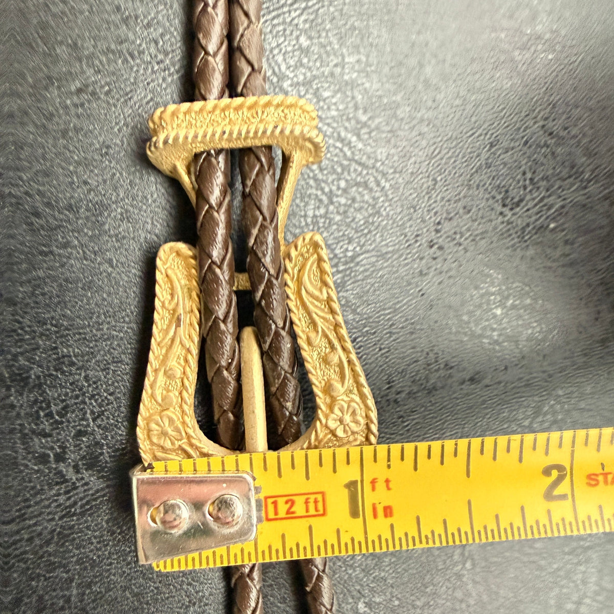 Vintage Western Buckle-Shaped Bolo Tie Brown Braided Leather Embossed Floral