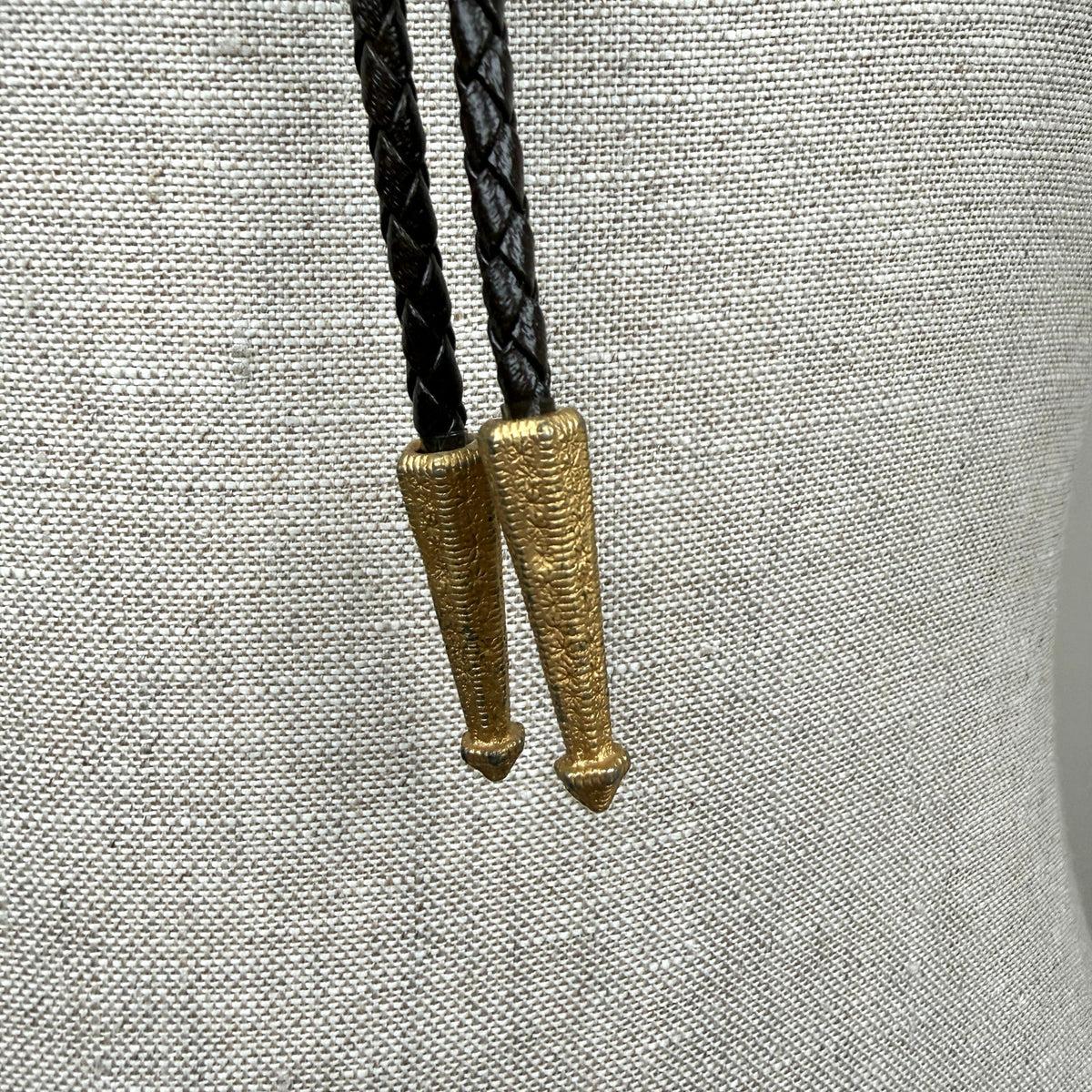 Vintage Western Buckle-Shaped Bolo Tie Brown Braided Leather Embossed Floral