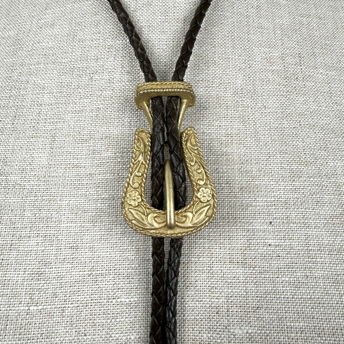 Vintage Western Buckle-Shaped Bolo Tie Brown Braided Leather Embossed Floral