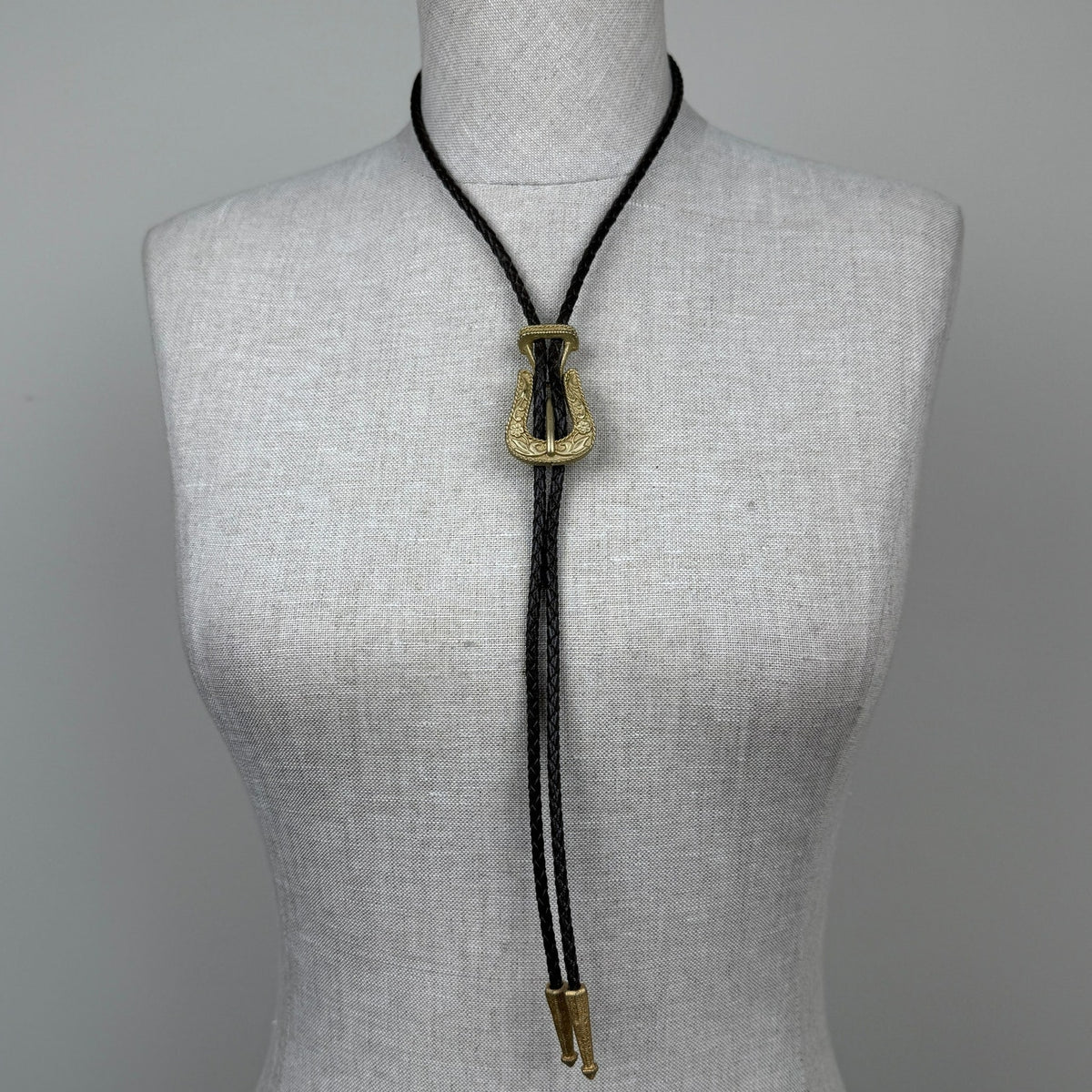 Vintage Western Buckle-Shaped Bolo Tie Brown Braided Leather Embossed Floral